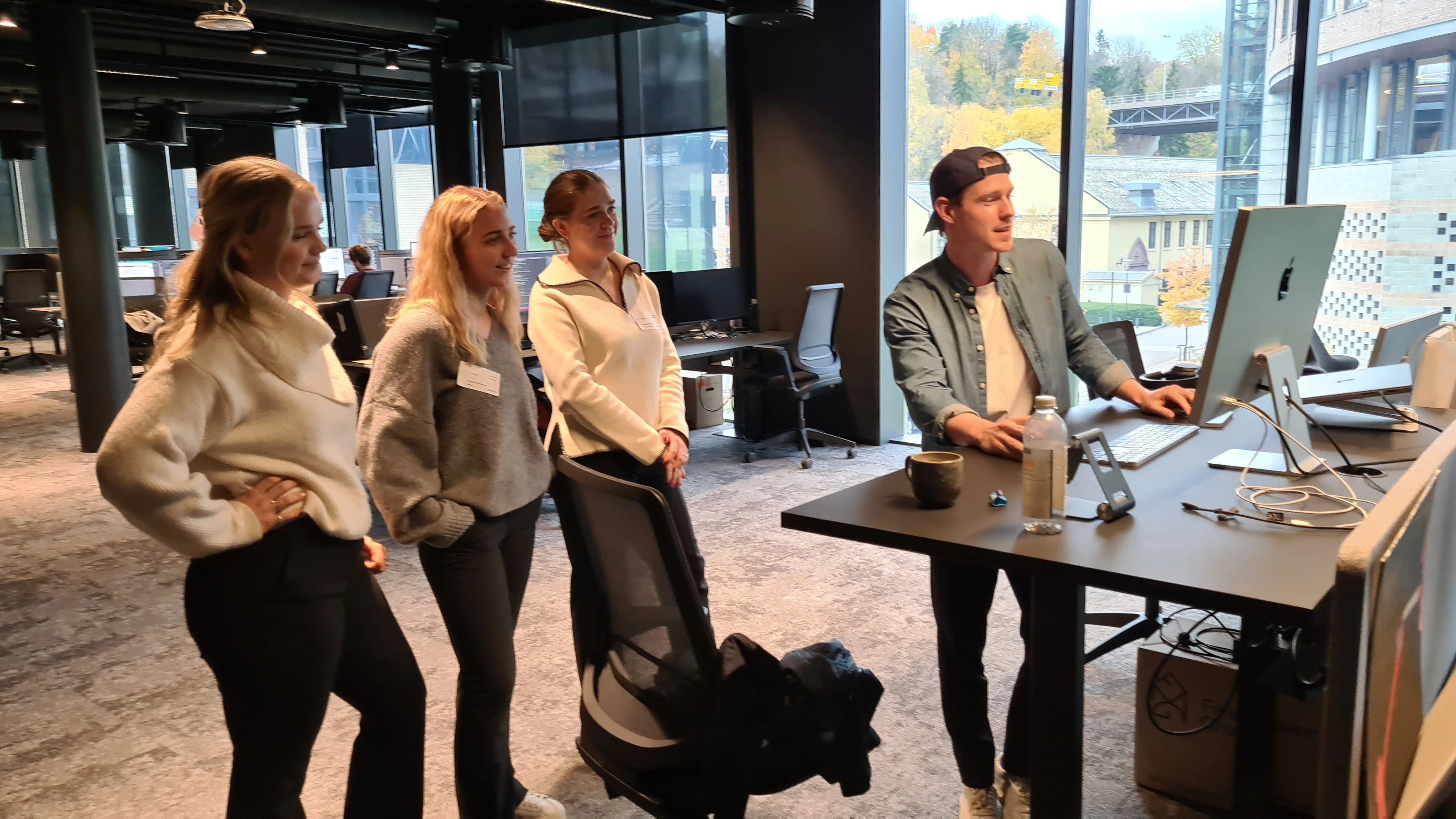 Stine and her two group-mates visiting the consulting agency InMeta.