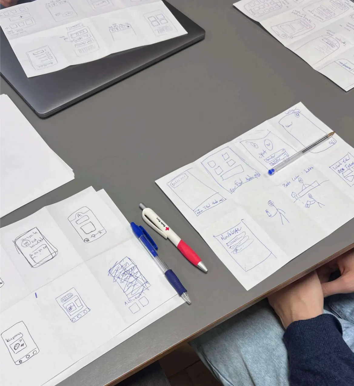 A table with Crazy 8's drawings.